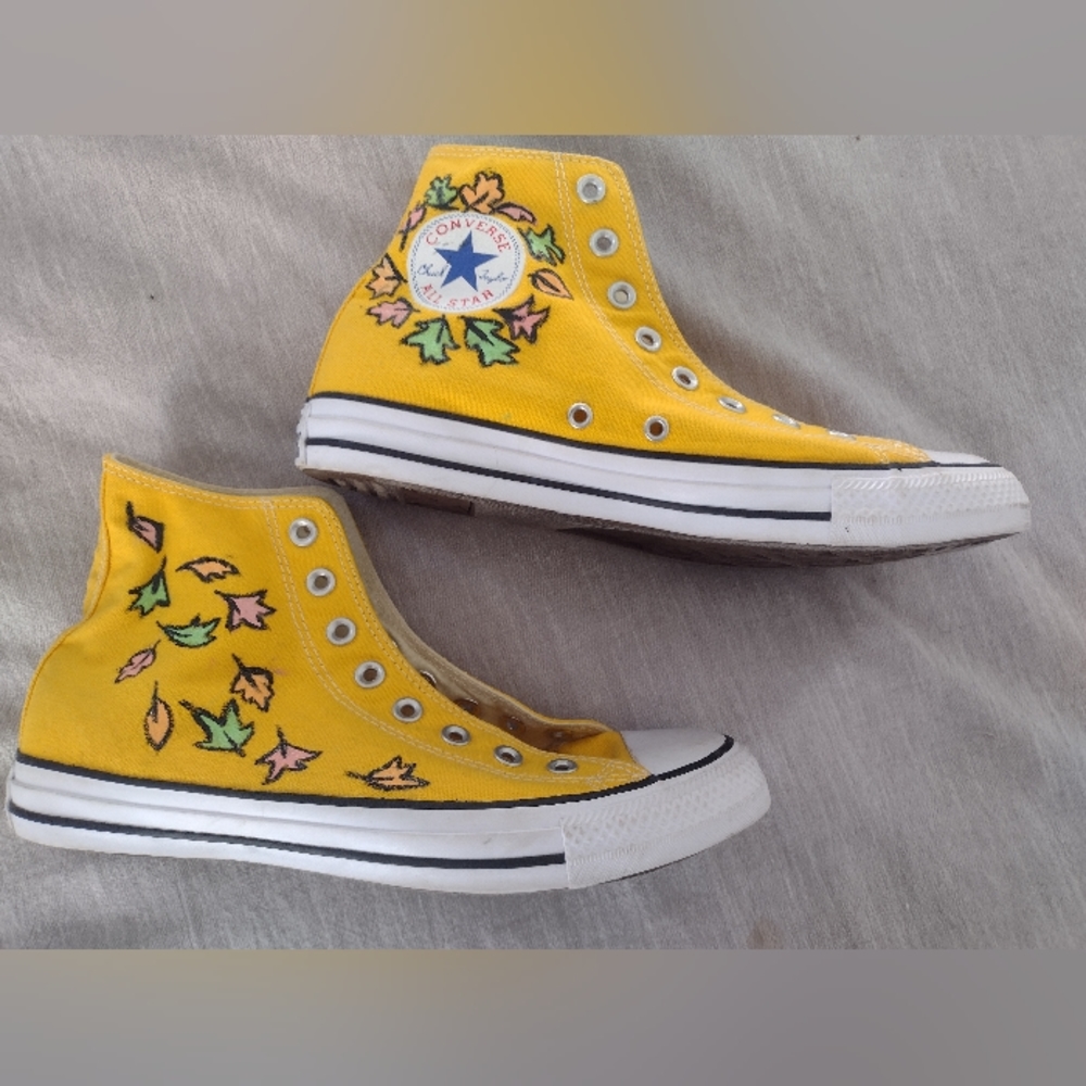 Yellow Converse high tops hand painted with Heartstopper leaves